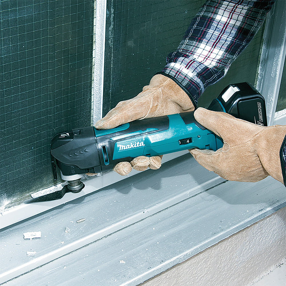 Makita akumultitööriist töös